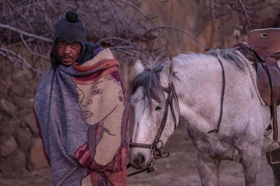 4x4 into Lesotho From Underberg - Horse Ride / Village Life - Lesotho Highlands Life: Stone Huts, Grazing Livestock, and Basotho Culture