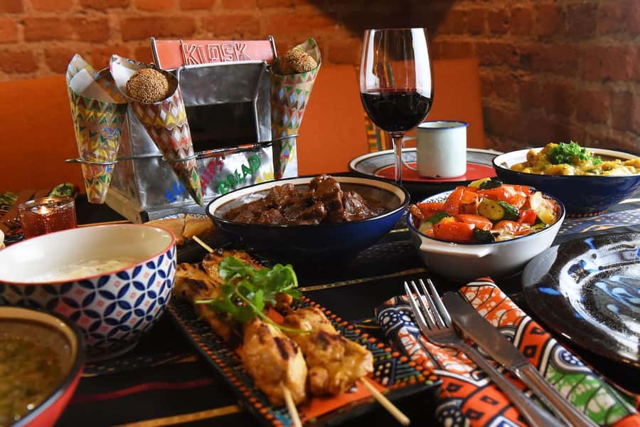 Cape Town: Gold Restaurant Spice Experience with Wine - From Gold-Leaf Bubbly to Djembe Drums at 18h30