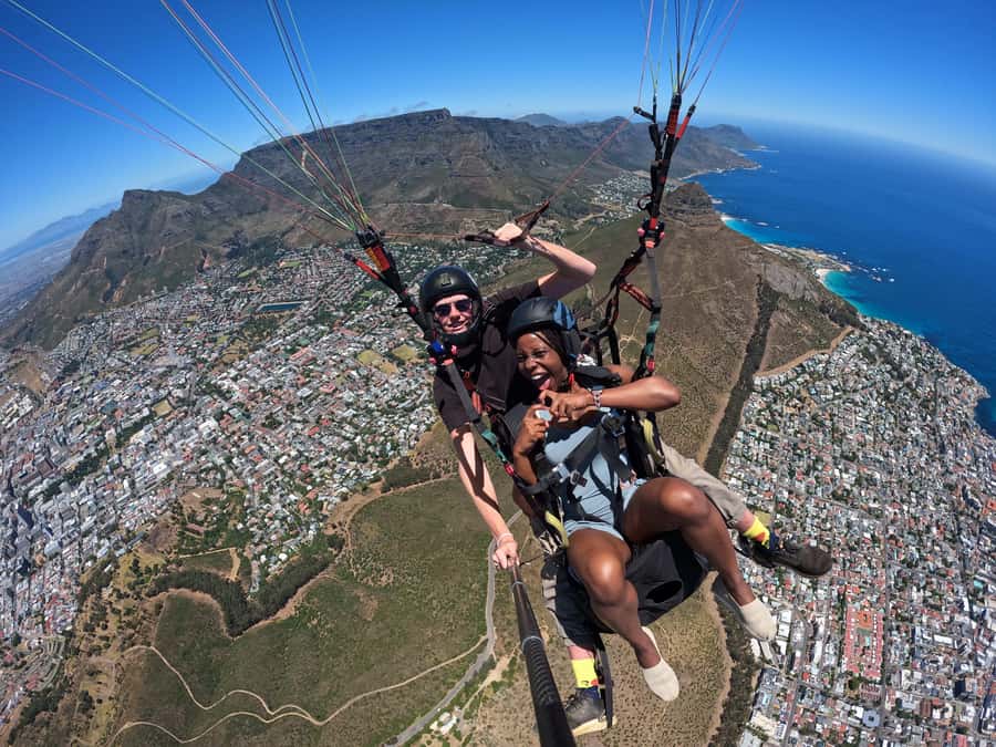 Cape Town: Tandem Paragliding with views of Table Mountain - Landing at the Promenade or The Glen Club, and getting your photos onto your phone