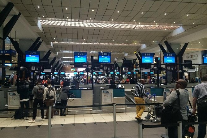 Comfort Private Airport Transfer: OR Tambo Airport (JNB) - The arrival plan: from slide doors to your name on a board