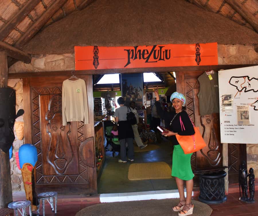 Durban: Phezulu Cultural Village & Reptile Park Tour - Hands-on with Cleo the Burmese python, the encounter that makes it memorable