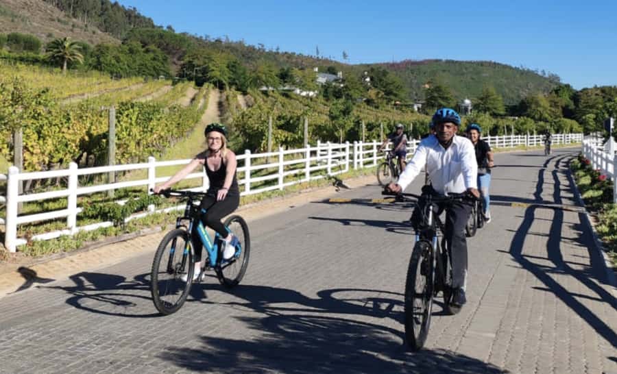Franschhoek: E-Bike & Wine Tour (Shared Tour) - Pedaling through historic Franschhoek and out toward the wine valley views