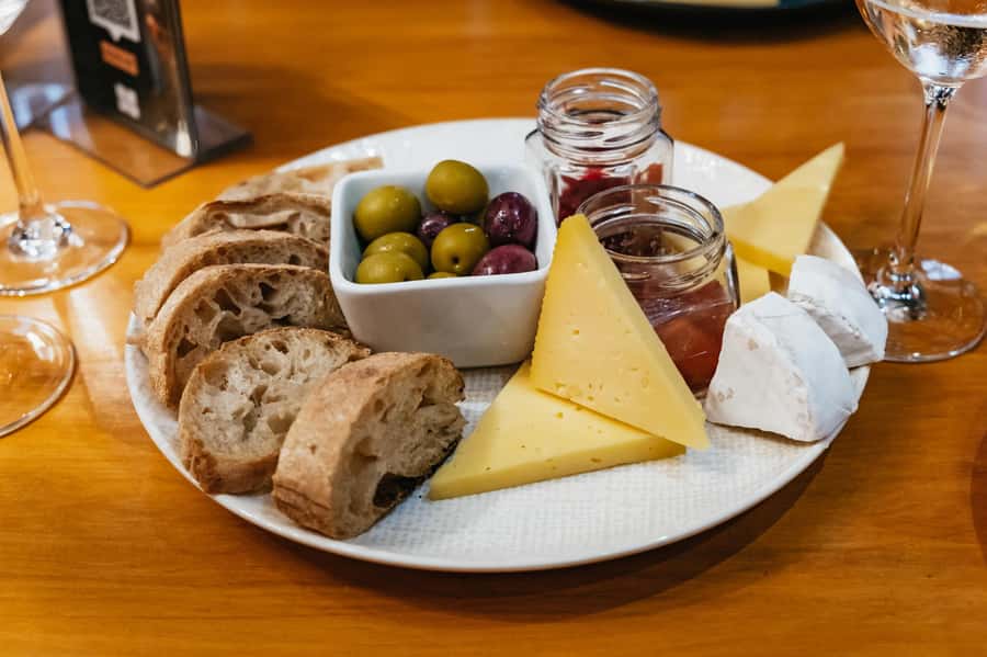 From Cape Town: 3 Regions Wine Tour with 3 Estates, 15 Wines - Paarl Afternoon: Sweet Wines, Relaxed Vineyard Views, and Snack Time