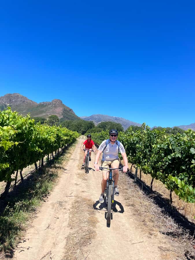 From Cape Town: Franschhoek Vineyards Bike Tour with Lunch - Starting In Franschhoek: Dutch Reformed Church Grounds And Town Views
