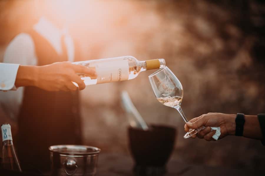 From Cape Town: Winelands Full Day Tour and Wine Tasting - Franschhoek, Huguenot streets, and the tram ride through the vineyards