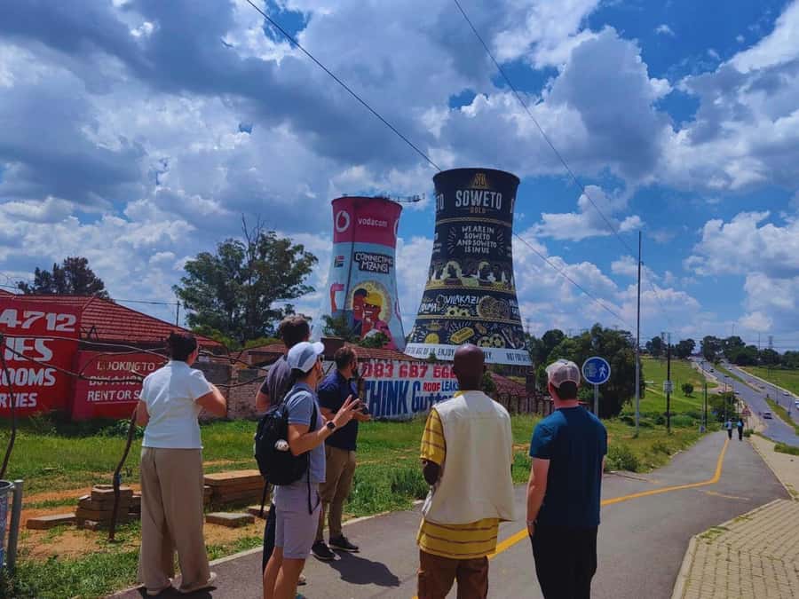 From Johannesburg: Pretoria, Soweto & Apartheid Museum Tour - Getting picked up, and why comfortable shoes matter here