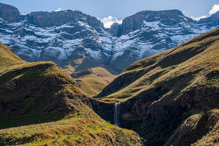 From Underberg: Sani Pass Day Tour and Basotho Village Visit - The downhill, panoramic Drakensberg views, and how the day lands