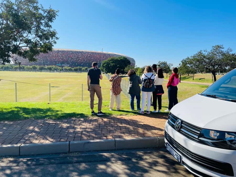 Half Day Soweto and Apartheid Museum Guided Tour - Houghton Estate and Munro Drive: Where the Day Sets Its Tone
