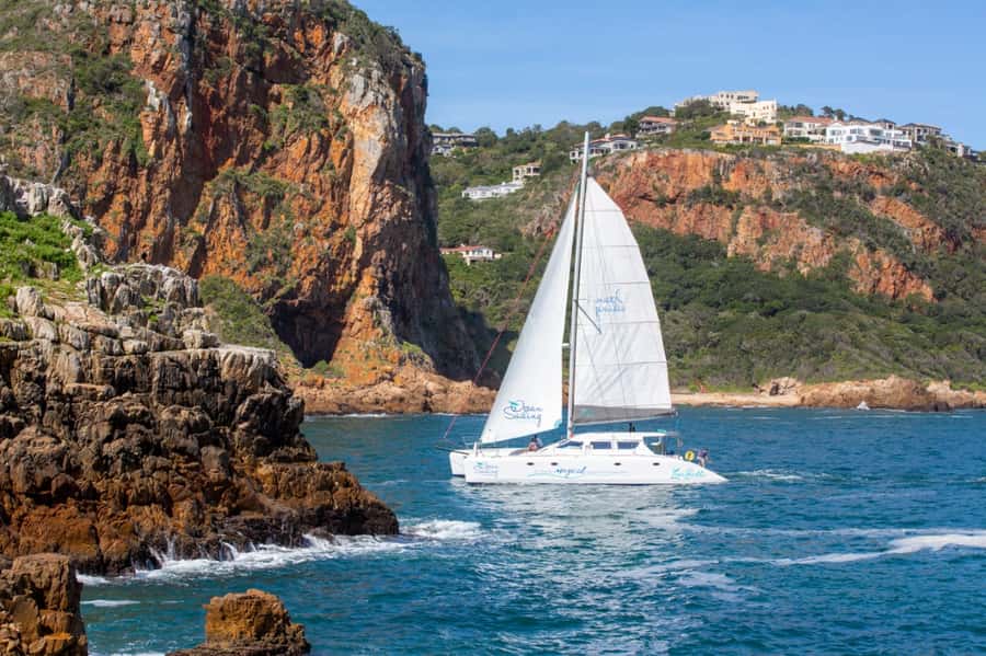Knysna: Luxury Sunset Cruise with Captain's Barbeque - Languages and Group Energy: Who This 2-Hour Cruise Fits Best