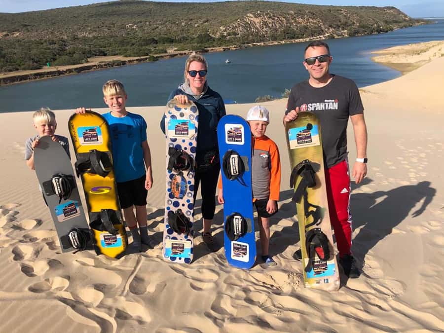 Port Elizabeth: Sandboarding with Short Boat Trip - Riding the Alexandria dune: long drops, climbs back up, and waxed boards