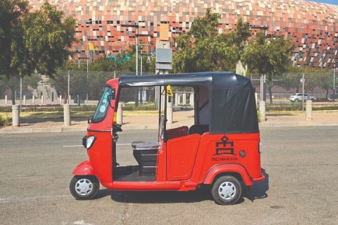 Private local authentic soweto Moto taxi experience - Lunch at Boma & Outdoor Restaurant: bunny chow and potjie-style stew made over fire