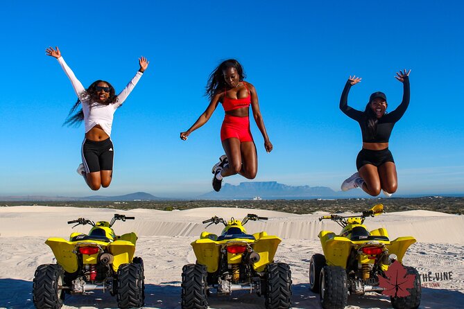 Quad bike in the Atlantis sand dunes Cape Town - Photo stops and Table Mountain views: how the guide turns the hour into content