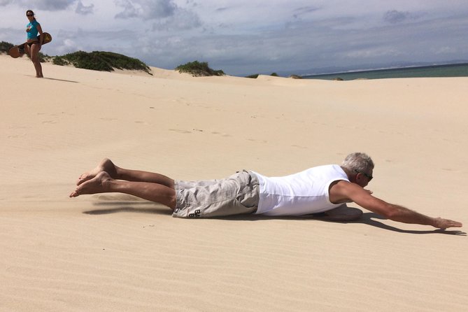 Sandboarding in Jeffreys Bay, South Africa - Standing and sitting boards: choosing the easiest path to fun