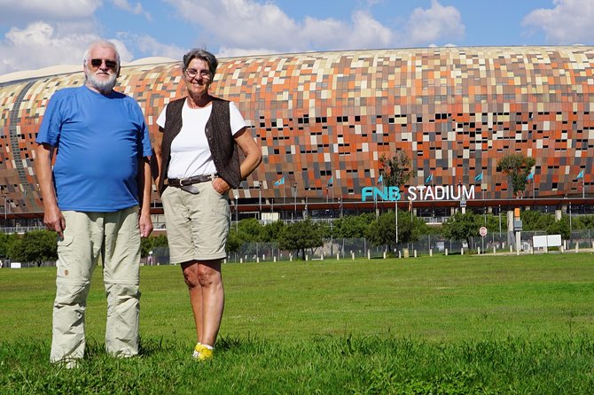 Soweto, Apartheid Museum & Constitution Hill Day Tour - Johannesburg inner-city drive: quick context on schools, taxis, and the Mandela Bridge