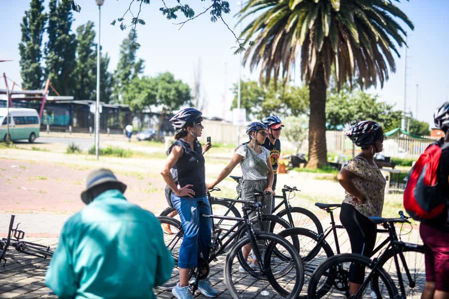 Soweto: Guided Bicycle Tour with Lunch - Mzimhlophe: from an internet cafe stop to Women’s hostel life